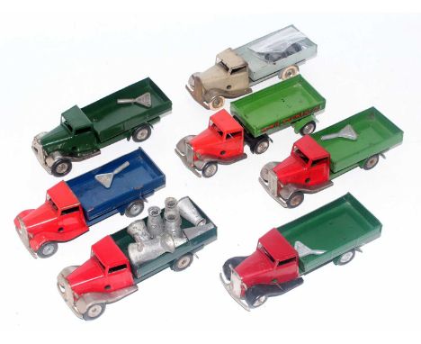Seven various loose Triang Minic tinplate and clockwork delivery vehicles, to include Minic Brewery Articulated tractor unit 
