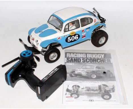 A Tamiya 1/10 scale kit built model of a radio controlled High Performance Racing Buggy Sand Scorcher, in working order with 