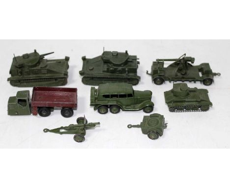 A collection of various loose Dinky Toy military diecasts to include a light tank, a medium tank, a 6-wheel reconnaissance ve