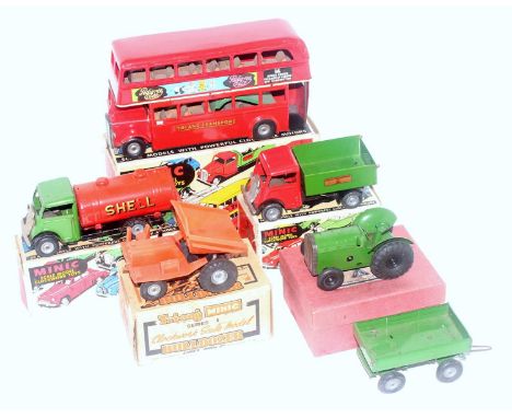 A Triang Minic boxed tinplate and clockwork vehicle group to include a Minic tractor and trailer, a Triang Minic clockwork bu