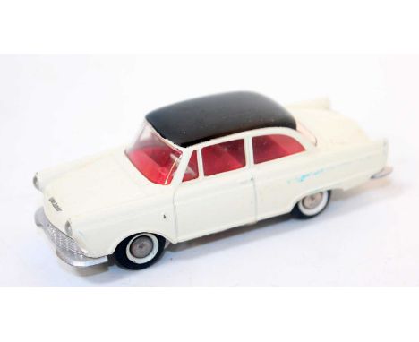 A Tekno loose model of a DKW Junior saloon comprising of white body with black roof and red interior,. complete with white wa