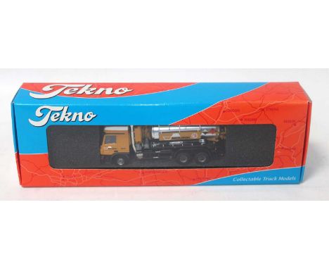 A Tekno 1/50 scale boxed model of a Mourik Mercedes Benz Actros vacuum truck, finished in sand livery, housed in the original