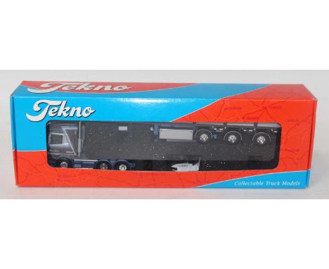 A Tekno 1/50 scale Gerard Serne model of a Scania 144L 530 V8 Topline tractor unit with stone trailer, housed in the original