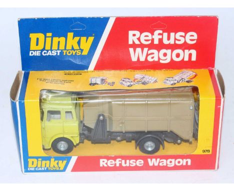 A Dinky Toys No. 978 refuse wagon comprising of light green cab with black chassis and grey back, housed in the original wind