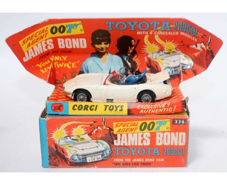 A Corgi Toys No.336 James Bond Toyota 2000 GT comprising of white body with black interior, Bond and driver figure present, h