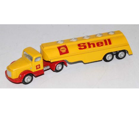 A Tekno No. 434 Shell Volvo articulated tractor unit and trailer comprising of red and yellow body with Shell livery, loose e