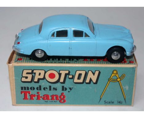 A Spot-On Models by Triang No. 114 Jaguar 3.4L saloon comprising light blue body with cream interior and spun hubs, housed in