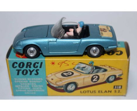 A Corgi Toys No. 318 Lotus Elan S2, comprising of metallic blue body with black interior and driver figure complete with a "I