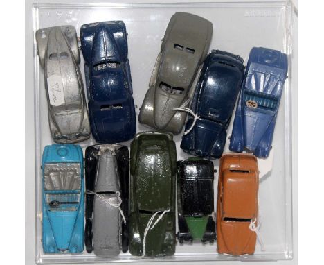Ten loose playworn Dinky Toy and Tootsie Toy diecast saloons and vehicles to include a Packard saloon finished in dark green,
