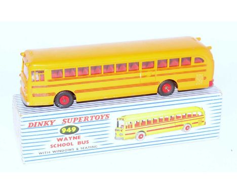 A Dinky Toys No. 949 Wayne School Bus comprising of yellow and red body with red plastic hubs and school bus livery, housed i