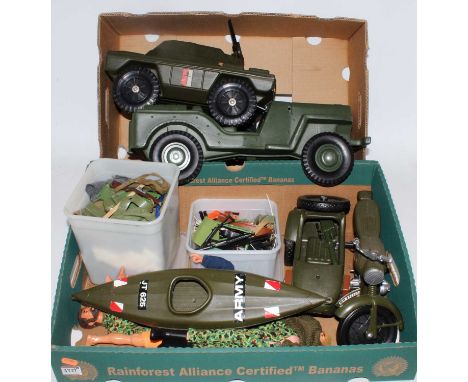 Two trays containing a large quantity of various Action Man accessories and vehicles to include army canoe, motorcycle and si