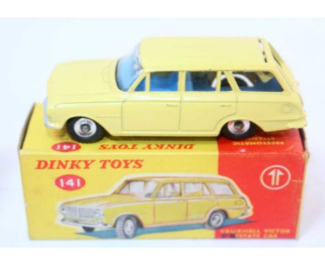 A Dinky Toys No. 141 Vauxhall Victor estate car comprising of lemon yellow body with blue interior and spun hubs, housed in t