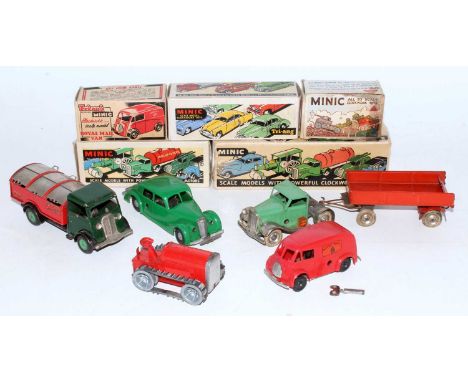 A Triang Minic tinplate and clockwork boxed commercial vehicle and saloon group to include a short bonnet dust cart, a revers