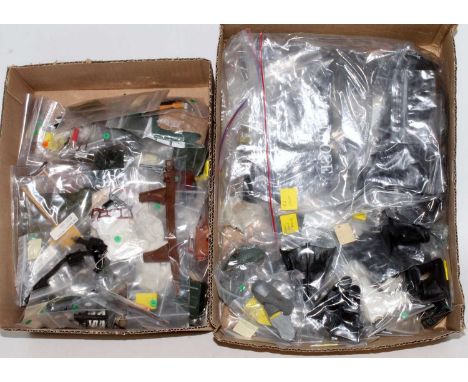 Three boxes containing a large quantity of various mixed loose Action Man accessories, to include head gear, boots, clothing,