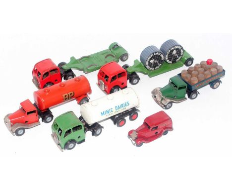 A Triang Minic tinplate and clockwork post war commercial vehicle group to include articulated low loader with cables limited