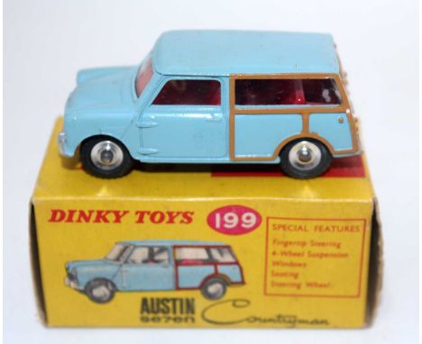 A Dinky Toys No. 199 Austin Countryman comprising of light blue body with red interior and spun hubs, housed in the original 