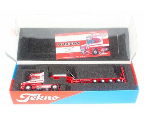 A Tekno 1/50 scale McGeown model of a Scania T480 T-cab tractor unit with four axle low loader trailer, appears complete, wit