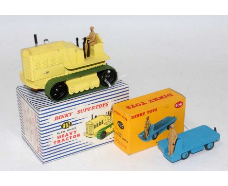 A Dinky Toys boxed commercial vehicle diecast group to include a No. 963 Heavy tractor finished in lemon yellow, with driver 