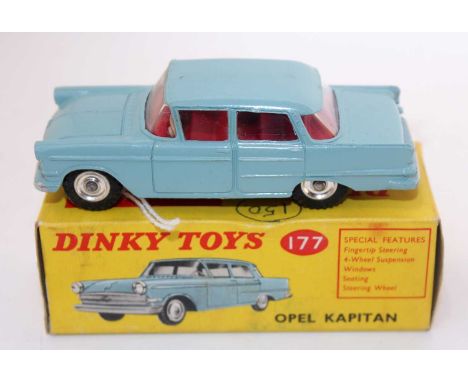 A Dinky Toys No. 177 Opal Kapitan comprising of light blue body with red interior and spun hubs housed in the original all-ca