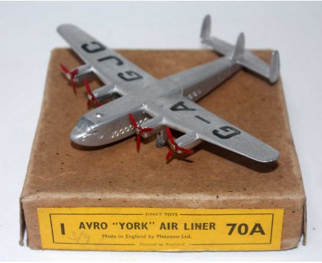 A Dinky Toys No. 70A Avro York Airliner comprising of silver body with four 3-blade red propellers, G-AGJC to wings, complete