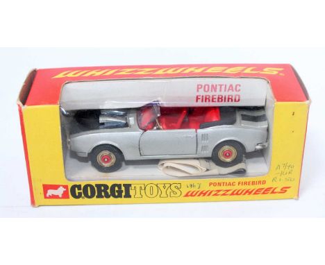 A Corgi Toys WhizzWheels No. 343 Pontiac Firebird, comprising of silver body with red interior and black bonnet and detailing