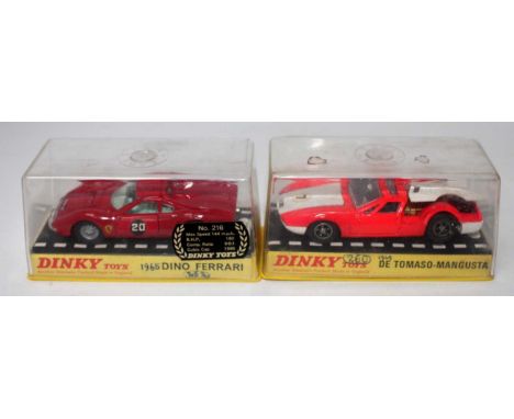 A Dinky Toys plastic cased diecast group to include a No. 216 Dino Ferrari comprising of red body with blue interior and raci