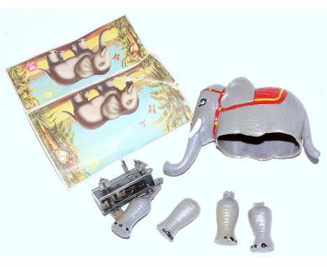 A Speilwaren plastic and clockwork elephant housed in the original card box remains, model requires restoration but appears c