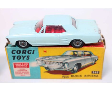 A Corgi Toys No. 245 Buick Riviera comprising of light blue body with wirework hubs and red interior, housed in the original 