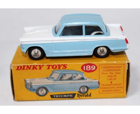 A Dinky Toys No. 189 Triumph Herald saloon comprising of light blue and white body and housed in the original correct colour 