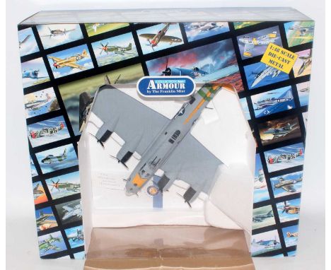 A collection armour by Franklin Mint model No. B11C978 model of a 1/48 scale 'Bit o lace' model of a USAAF 447 B17G housed in