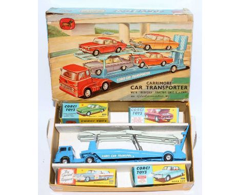 A Corgi Toys gift set 26 Carrimore Car Transporter with four boxed cars comprising of blue car transporter with hubs together