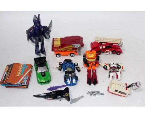 A collection of various original and later transformers, mixed examples to include fire engine, leaflets, and othersCondition