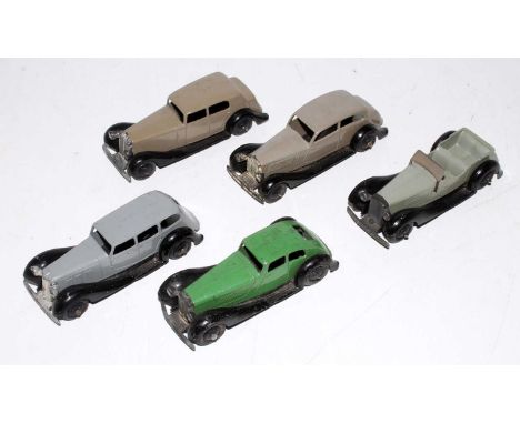 Five various loose Dinky Toy 30 series saloons, all with minor playwear, examples to include a No. 36D Rover saloon, a No. 36