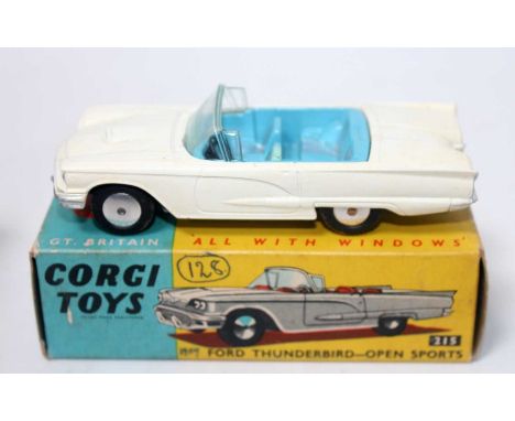 A Corgi Toys No. 215 Ford Thunderbird Open Sports comprising of white body with blue interior, fitted with spun hubs and hous