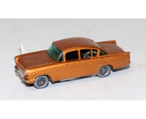 A Matchbox No.22 1958 Vauxhall Cresta comprising of metallic gold body with blue glazing and silver plastic wheels, very mino