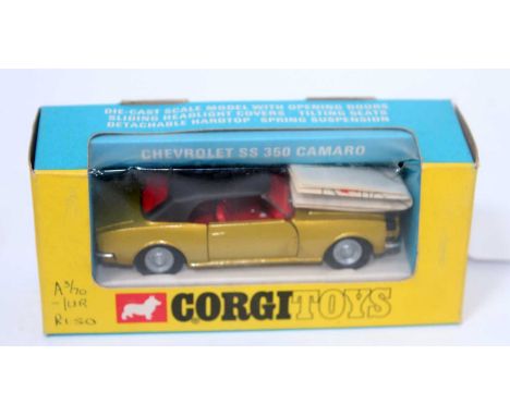 A Corgi Toys No. 338 Chevrolet SS350 Camaro comprising of metallic lime green body with black roof and red interior, housed i
