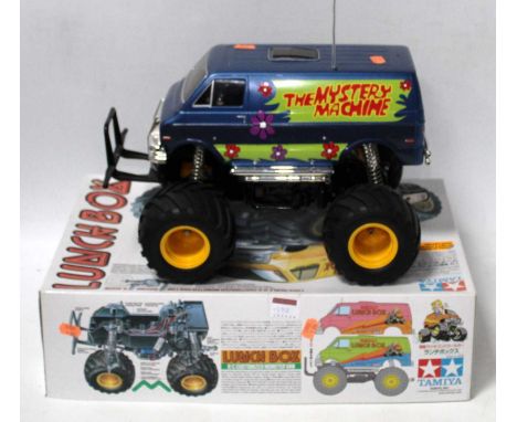 A Tamiya model No. 58347 1/12 scale radio controlled model of a lunchbox 4x4 mystery machine Monster Truck/van, in the origin