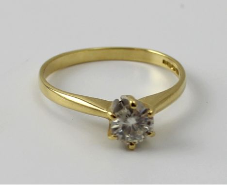 An 18ct yellow gold and diamond solitaire ring, the round brilliant cut stone approx 0.25ct, size K, approx 1.9g.