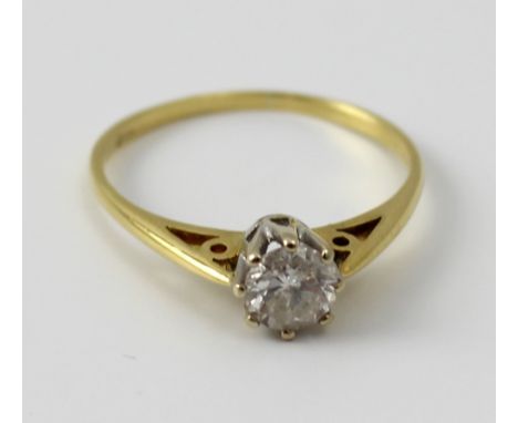 An unmarked yellow metal and diamond solitaire ring, the round brilliant cut stone approx 0.33ct, size N, approx 1.85g.