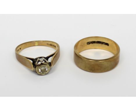 A 9ct gold wedding band, size K, and a 9ct gold ring with a small solitaire diamond, size K, approx combined 5g (2).