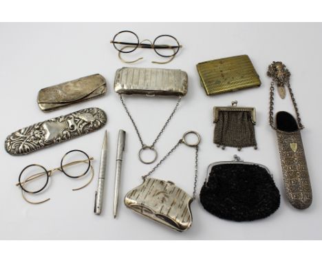 Two hallmarked silver purses; Birmingham 1915 and 1916, a hallmarked silver spectacles case, Birmingham 1909, a hallmarked si