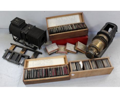 Two magic lantern projectors (one af), one boxed and a large selection of glass projector slides, some of Barmouth in North W