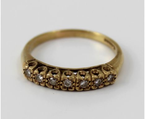 A 9ct gold ladies dress ring platform set with seven small white stones, size Q, approx 2.6g.