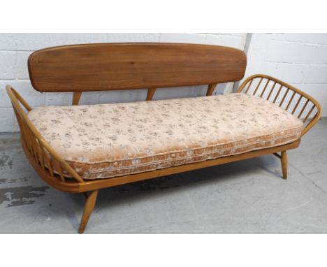 A retro Ercol studio sofa, length 212cm.