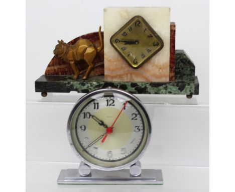 An Art Deco marble Cubist-style mantel clock, the gilded dial set with Arabic numerals, height 14cm and an Art Deco style eig