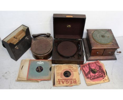 An HMV oak-cased gramophone base unit, a walnut-cased HMV boxed gramophone and one other walnut-cased example with Bakelite p