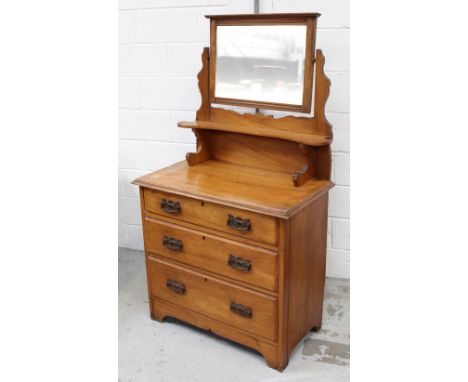 An Edwardian swing mirror back dressing table, three drawers on bracket supports, 160 x 82cm.