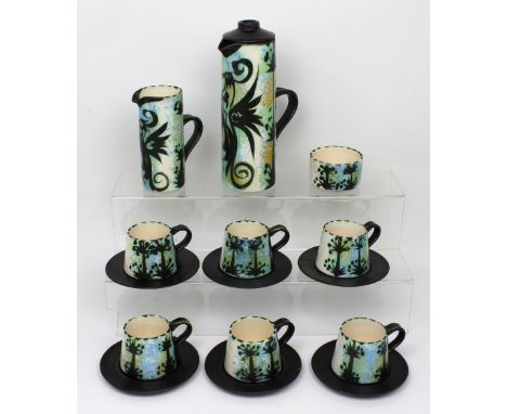 A Newlyn Celtic Pottery coffee set, six-setting comprising coffee pot, milk jug, sugar bowl with lid, six saucers and six cup