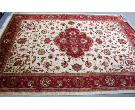 A modern beige ground Keshan carpet, 280 x 200cm.