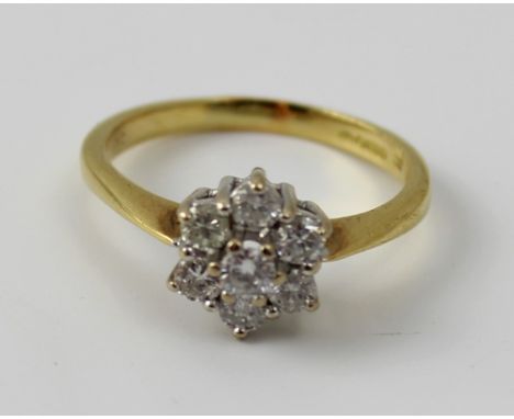 An 18ct yellow gold and diamond cluster ring, size L 1/2, approx 3.2g.